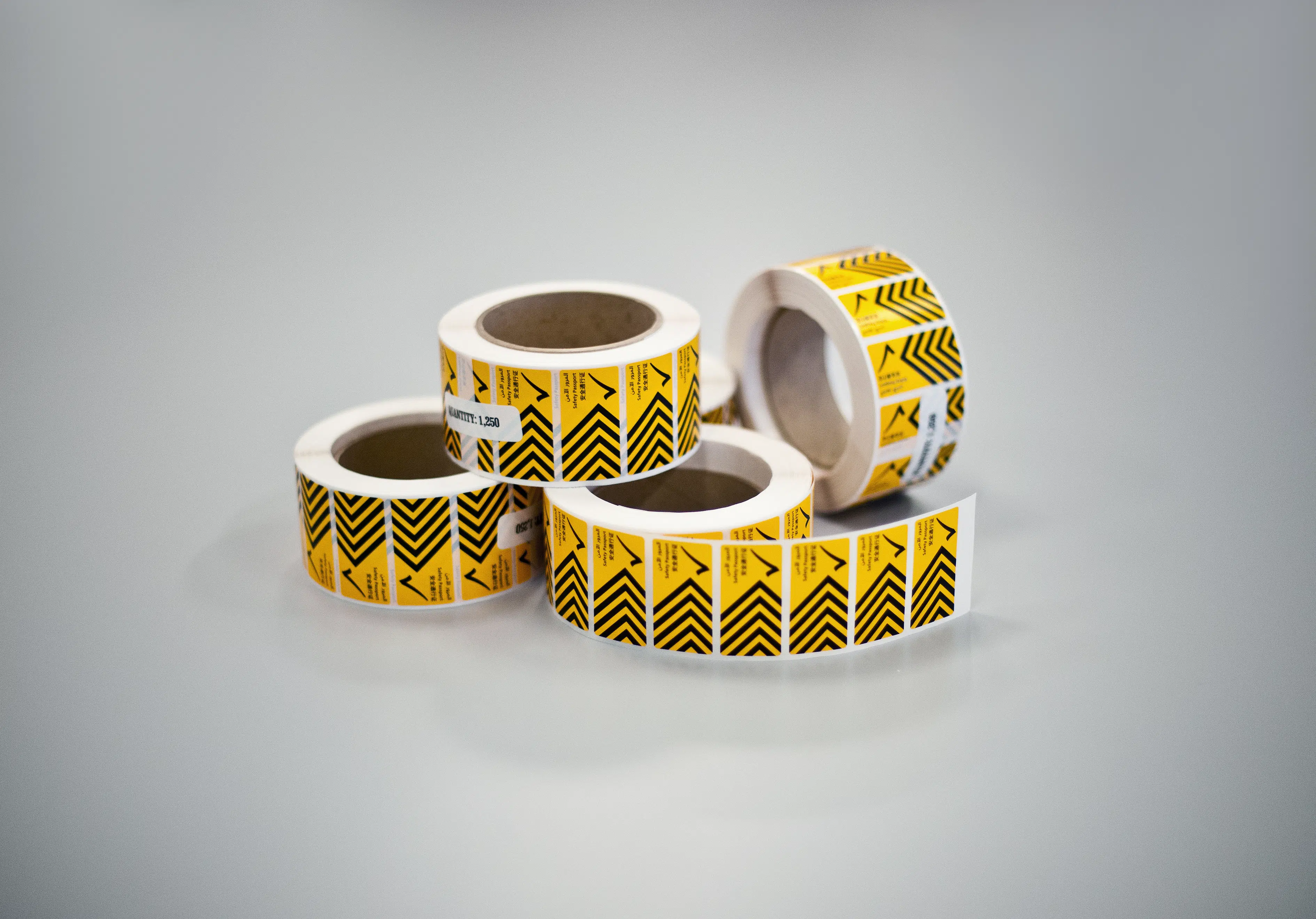 Four yellow tapes with black details